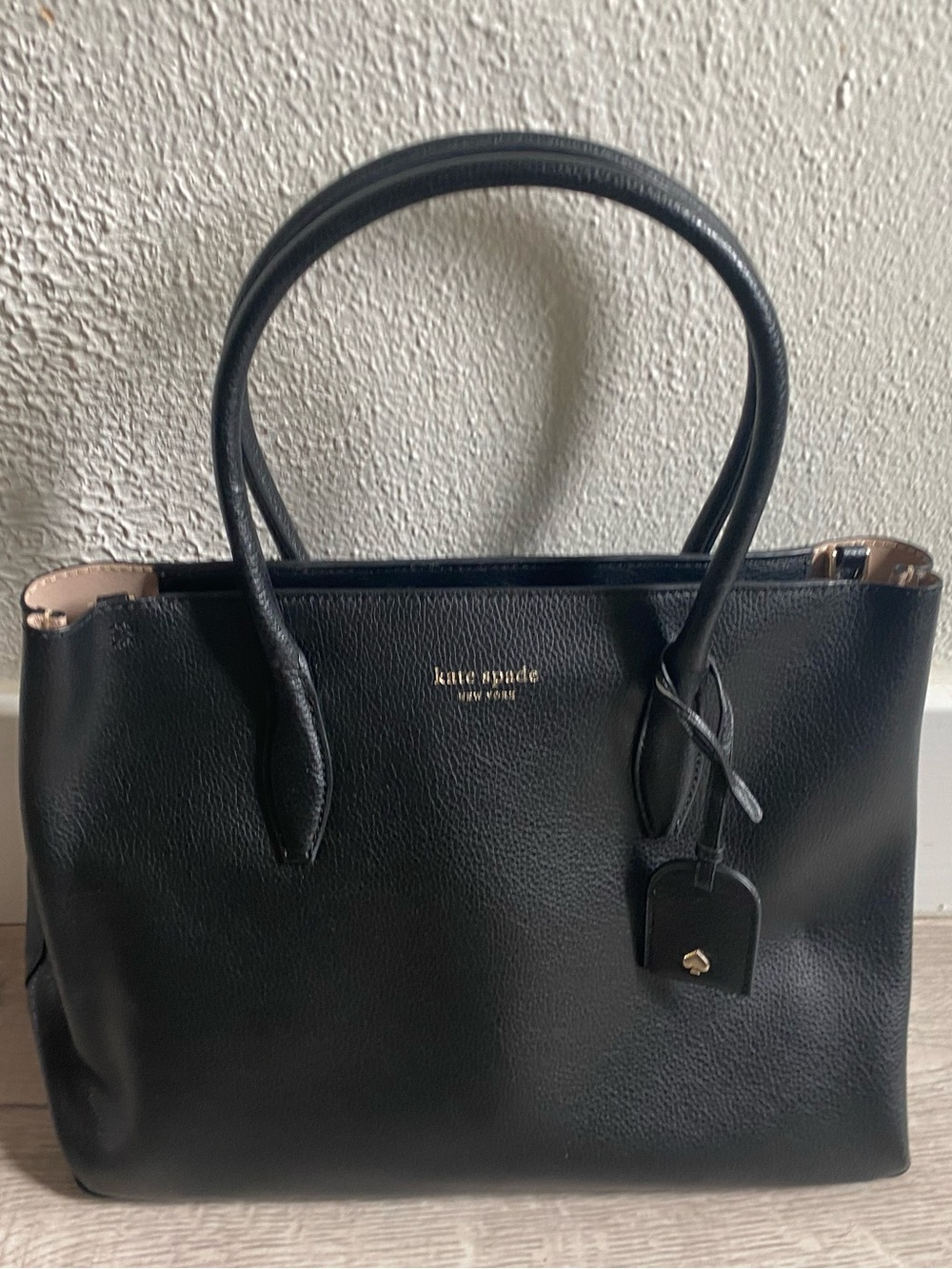 kate spade black leather tote with gold logo